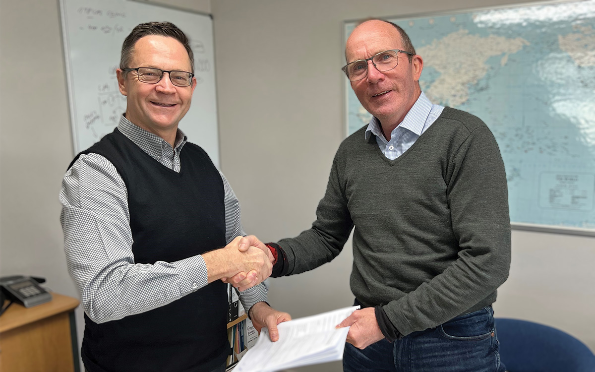 Kevin Maurice and Andrew McKenzie shake hands on Atrax South Island deal